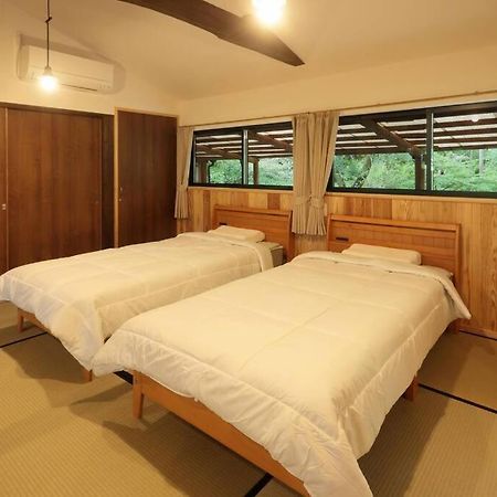 【コテージくぎの】大谷川沿いの露天風呂があるコテージ Minamiaso Exterior photo